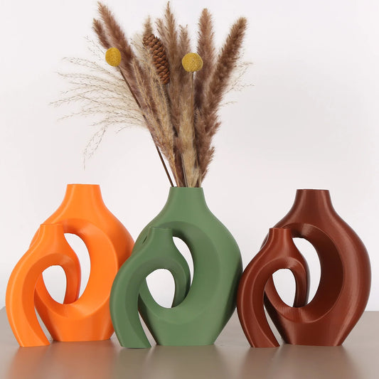 A set of 2 Bohemian-chic round plastic vases, suitable for home and office decoration